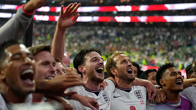 England players celebrate after the World Cup round of 16 soccer match between Mexico and England in Mexico City, Sunday, July 5, 2026 - (AP Photo/Ricardo Mazalan)