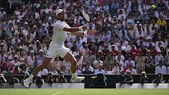 Novak Djokovic of Serbia returns the ball to Roman Saffiulin of Russia in their fourth round men's singles match at the Wimbledon Tennis Championships in London. - Photo: AP/Brian Inganga