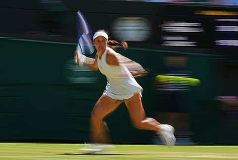 Jessica Pegula of the United States plays a return during the women's singles fourth round match against Iva Jovic of the United States at the Wimbledon Tennis Championships in London, Sunday, July 5, 2026.