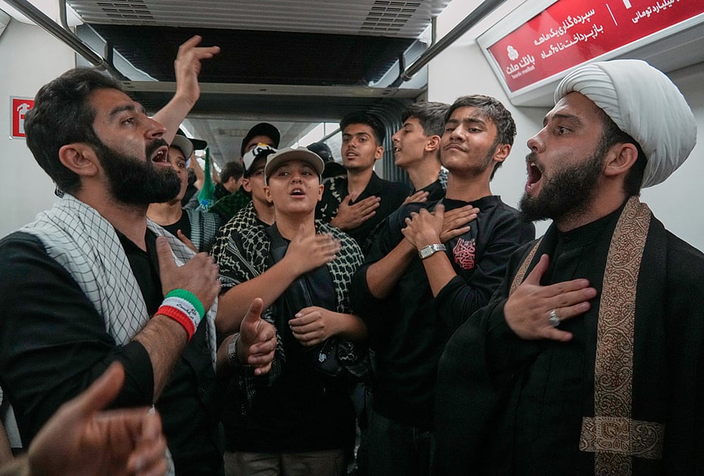 mourners in tehran khamenei funeral
