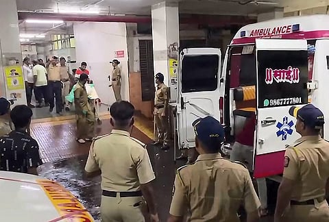Police personnel and others at a hospital where victims were brought after a three-storey 'chawl', row tenement, collapsed amid heavy monsoon rains, at Mankhurd area, in Mumbai, Maharashtra. At least six persons were killed and one sustained injuries in the incident on Sunday night. 