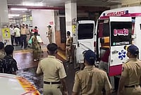 Outlook Explains | Mumbai's Mankhurd Building Collapse: Why Do Buildings Keep Collapsing Here Every Monsoon? | Photo: PTI : Police personnel and others at a hospital where victims were brought after a three-storey 'chawl', row tenement, collapsed amid heavy monsoon rains, at Mankhurd area, in Mumbai, Maharashtra. At least six persons were killed and one sustained injuries in the incident on Sunday night.