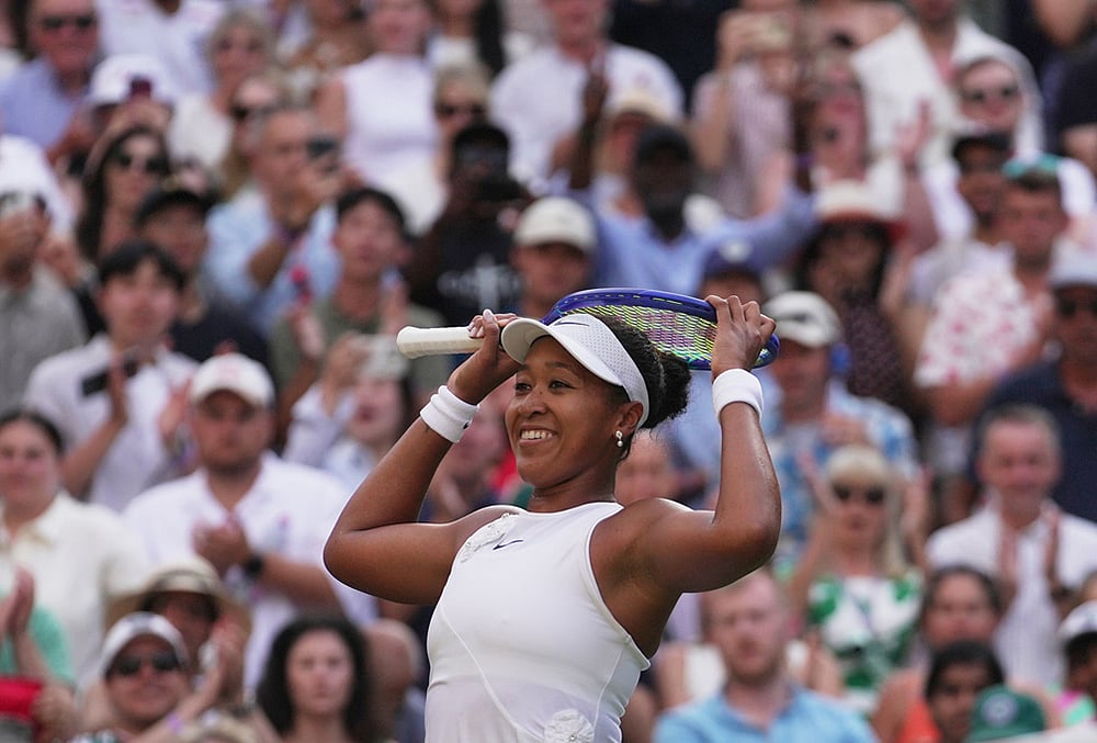 Naomi Osaka of Japan celebrates her victory against Aryna Sabalenka of Belarus in their fourth round women's singles match at the Wimbledon Tennis Championships in London, Sunday, July 5, 2026.  - | Photo: AP/Brian Inganga