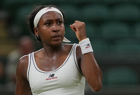 Coco Gauff of the United States celebrates a point against Belinda Bencic of Switzerland in their fourth round women's singles match at the Wimbledon Tennis Championships in London, Sunday, July 5, 2026. 
