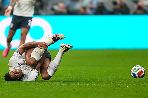 England's Jude Bellingham (10) reacts after a tackle during the World Cup round of 16 soccer match between Mexico and England in Mexico City, Sunday, July 5, 2026