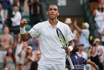 | Photo: AP/Kin Cheung : Felix Auger-Aliassime of Canada celebrates winning the mens singles fourth round match against Alejandro Davidovich Fokina of Spain at the Wimbledon Tennis Championships in London, Sunday, July 5, 2026.
