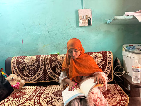 Nasreen, a class 9th Student who maintains the heat register for her whole family. 