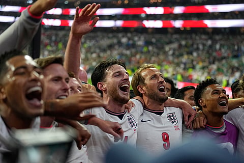England players celebrate after the World Cup round of 16 soccer match between Mexico and England in Mexico City, Sunday, July 5, 2026