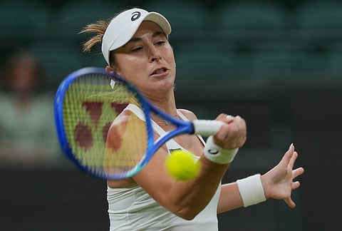 Belinda Bencic of Switzerland returns the ball to Coco Gauff of the United States in their fourth round women's singles match at the Wimbledon Tennis Championships in London, Sunday, July 5, 2026. 