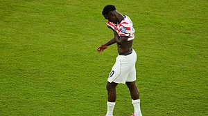 Jeff Chiu/AP Photo : United States' Folarin Balogun (20) walks off the field after receiving a red card during the World Cup round of 32 soccer match between the United States and Bosnia in Santa Clara
