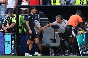 (AP Photo/Maddy Grassy) : United States' Christian Pulisic (10) is greeted by a team member as he is being substituted during the World Cup round of 16 soccer match between the United States and Belgium in Seattle, Monday, July 6, 2026