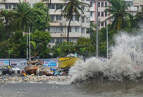 Sea waves lash the shoreline near Badhwar Park amid rain, in Mumbai, Monday, July 6, 2026. 