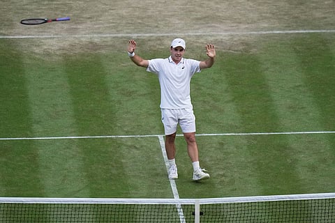 Arthur Fery of Britain celebrates winning against Grigor Dimitrov of Bulgaria in their fourth round men's singles match at the Wimbledon Tennis Championships in London.