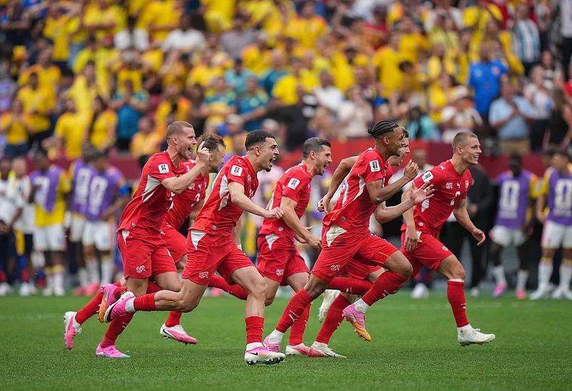 Switzerland players celebrate after defeating Colombia in a penalty shootout in the World Cup round of 16 soccer match between Switzerland and Colombia in Vancouver