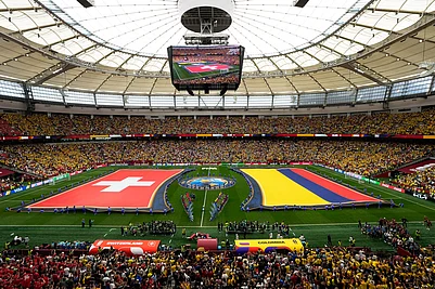 Gregory Bull/AP Photo : The flags of Switzerland, left, and Colombia, are displayed before their the World Cup round of 16 soccer match in Vancouver, British Columbia