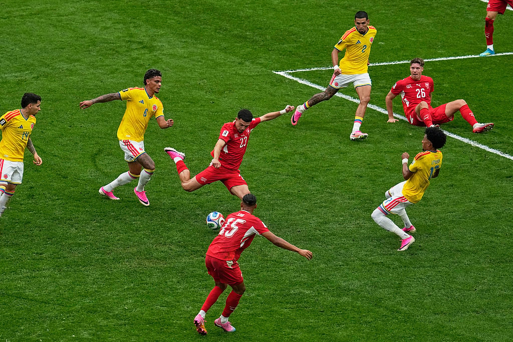 Switzerlands Zeki Amdouni (23) shoots on goal against Colombia during the World Cup round of 16 soccer match in Vancouver, British Columbia