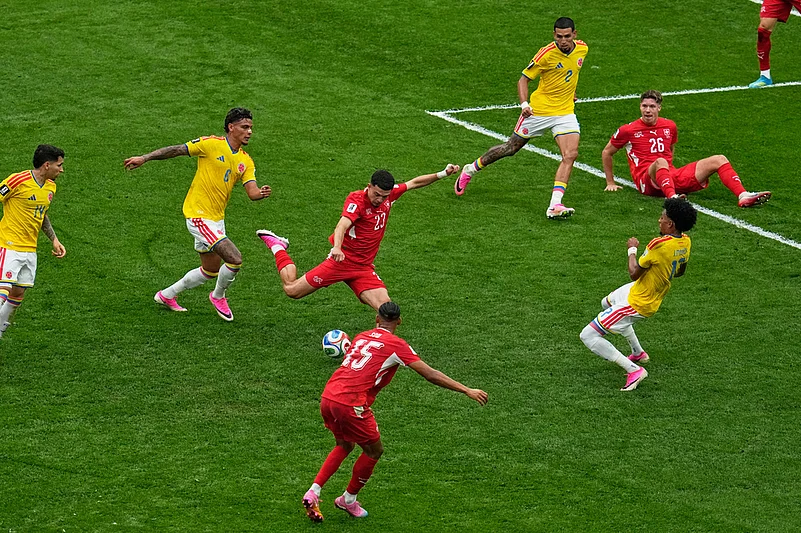 Switzerlands Zeki Amdouni (23) shoots on goal against Colombia during the World Cup round of 16 soccer match in Vancouver, British Columbia