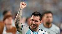 Rebecca Blackwell/AP Photo : Argentina's Lionel Messi, center, celebrates after the World Cup round of 32 soccer match against Cape Verde in Miami Gardens