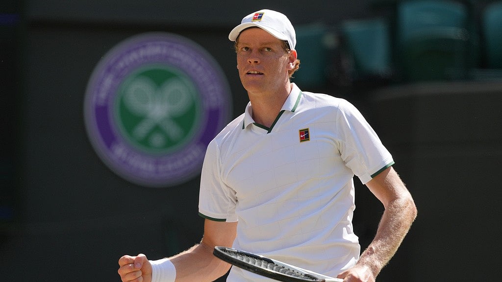 Jannik Sinner of Italy celebrates his victory against Jan-Lennard Struff of Germany in the quarter-final men's singles competition of the Wimbledon Tennis Championships in London. - Kin Cheung/AP Photo