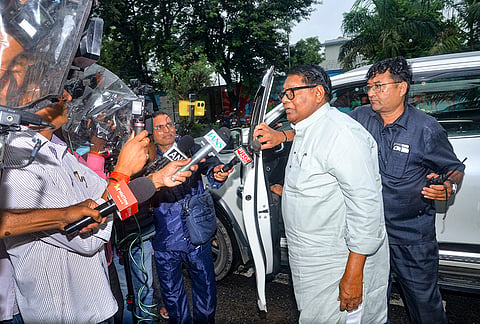 Jharkhand former Finance Minister Rameshwar Oraon speaks to media, as the Enforcement Directorate (ED) on Monday questioned his son Rohit Oraon in connection with the alleged liquor scam and money laundering case linked to Yogendra Tiwari, in Ranchi.