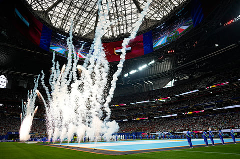 Fireworks go off before the start of the World Cup round of 16 soccer match between Argentina and Egypt in Atlanta, Tuesday, July 7, 2026.