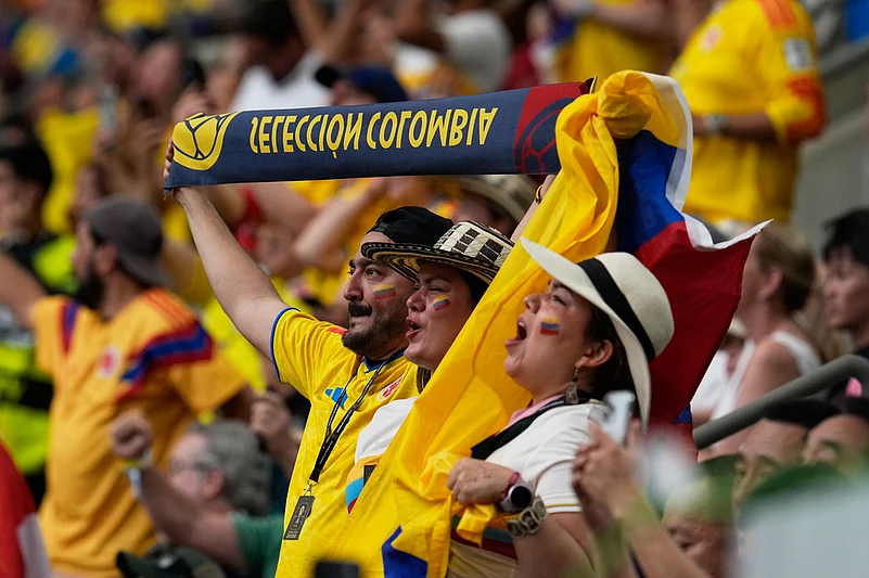 Colombia fans revel before the World Cup round of 16 soccer match against Switzerland in Vancouver
