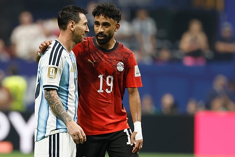 Argentina's Lionel Messi (10) and Egypt's Marawan Attia (19) during the World Cup round of 16 soccer match between Argentina and Egypt in Atlanta, Tuesday, July 7, 2026.