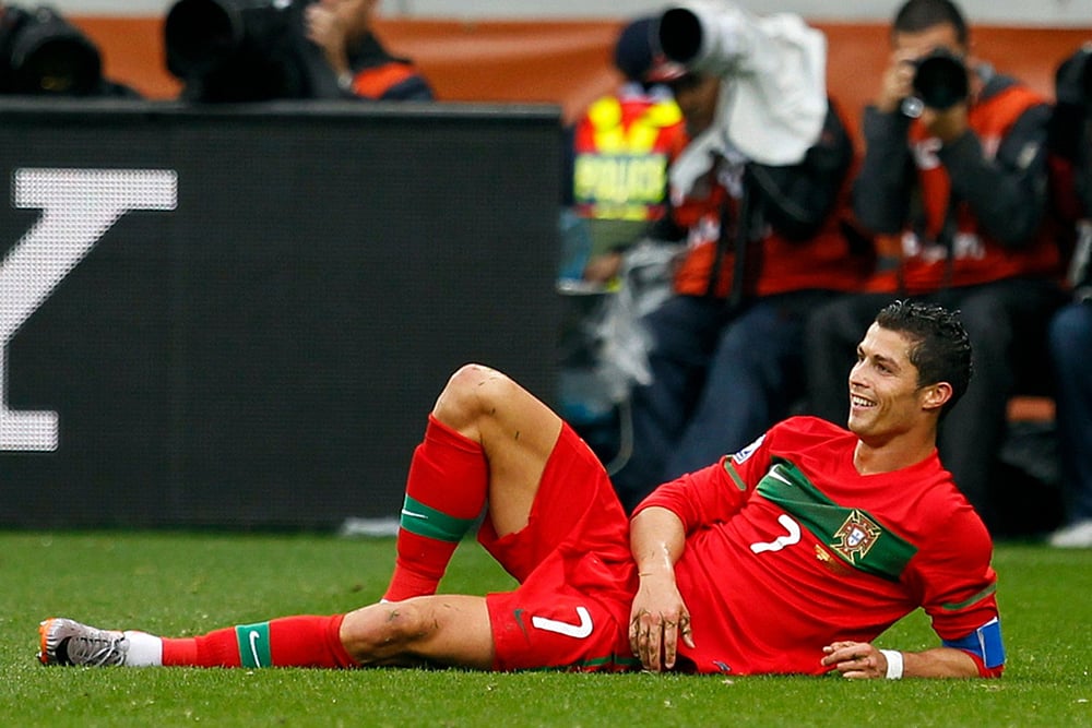 Portugal's Cristiano Ronaldo smiles during the World Cup group G soccer match against North Korea in Cape Town, South Africa, June 21, 2010. Portugal won 7-0. - | Photo: AP/Armando Franca, File