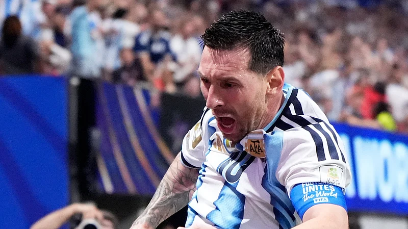 (AP Photo/Mike Stewart) : Argentina's Lionel Messi (10) celebrates after scoring his side's second goal during the World Cup round of 16 soccer match between Argentina and Egypt in Atlanta.