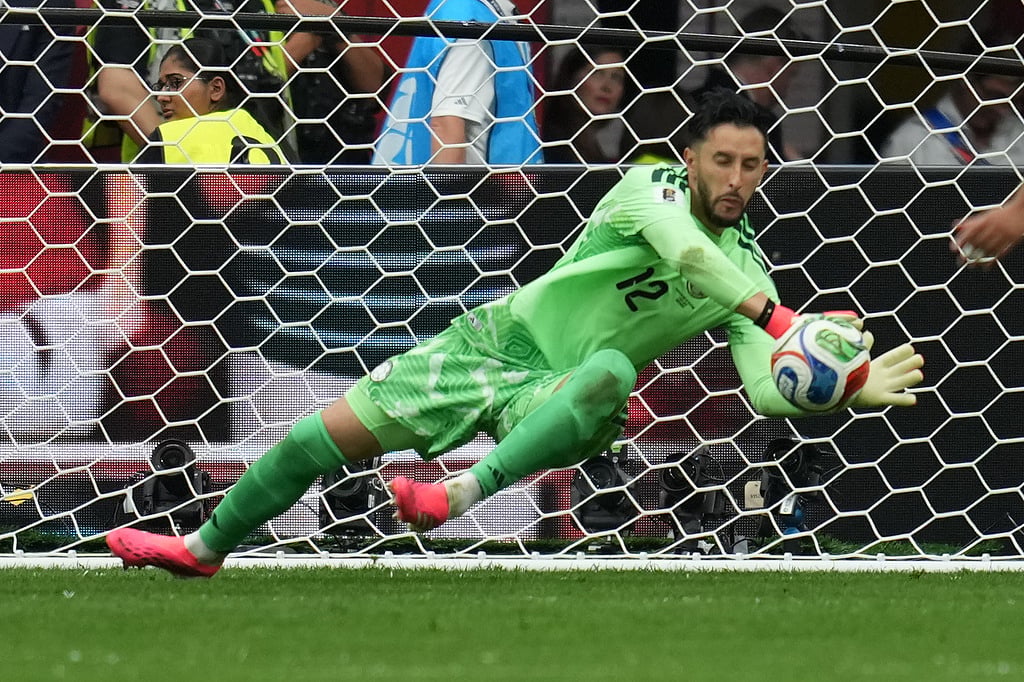 Colombia goalkeeper Camilo Vargas (12) saves during the World Cup round of 16 soccer match between Switzerland and Colombia in Vancouver