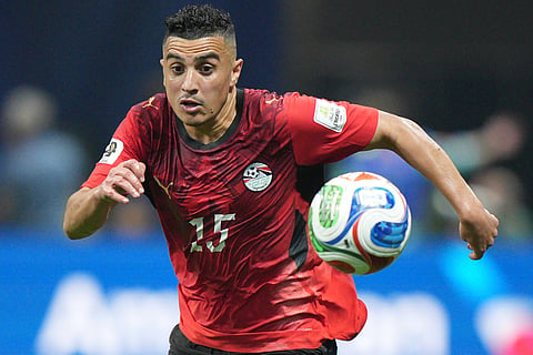 Egypt's Karim Hafez (15) goes for the ball during the World Cup round of 16 soccer match between Argentina and Egypt in Atlanta, Tuesday, July 7, 2026. 