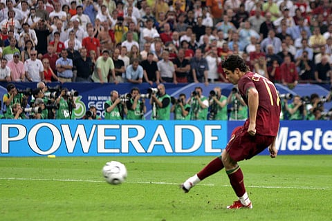 Portugal's Cristiano Ronaldo scores the winning penalty kick during a shoot out against England at a quarterfinal World Cup soccer match in Gelsenkirchen, Germany, July 1, 2006. Portugal won 3-1 in a penalty kick shootout.