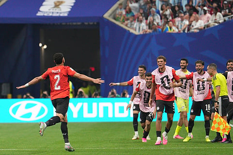 Egypt's Yasser Ibrahim (2) celebrates after scoring the opening goal of his team during the World Cup round of 16 soccer match between Argentina and Egypt in Atlanta, Tuesday, July 7, 2026.