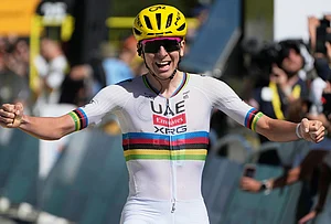 | Photo: AP/Mosa'ab Elshamy : Slovenia's Tadej Pogacar celebrates as he crosses the finish line to win the third stage of the Tour de France cycling race with start in Granollers and finish in Les Angles , France, Monday, July 6, 2026.