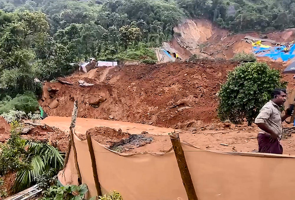 Rescue operation underway after a landslide at Kalladi, near Meppadi tunnel project in Wayanad, Kerala. - | Photo: PTI