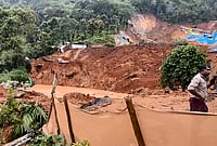 Day In Pics: July 07, 2026 | Photo: PTI : Rescue operation underway after a landslide at Kalladi, near Meppadi tunnel project in Wayanad, Kerala.