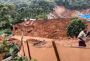 | Photo: PTI : Rescue operation underway after a landslide at Kalladi, near Meppadi tunnel project in Wayanad, Kerala.