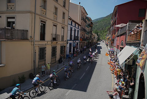 The riders pedal during the third stage of the Tour de France cycling race with start in Granollers and finish in Les Angles, France, Monday, July 6, 2026. 