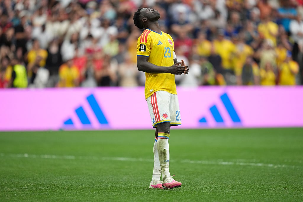 Colombias Davinson Sanchez (23) reacts after missing during penalty shootout during the World Cup round of 16 soccer match between Switzerland and Colombia in Vancouver