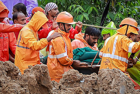 Rescue operation underway after a landslide at Kalladi, near Meppadi tunnel project in Wayanad, Kerala, Tuesday, July 7, 2026. 