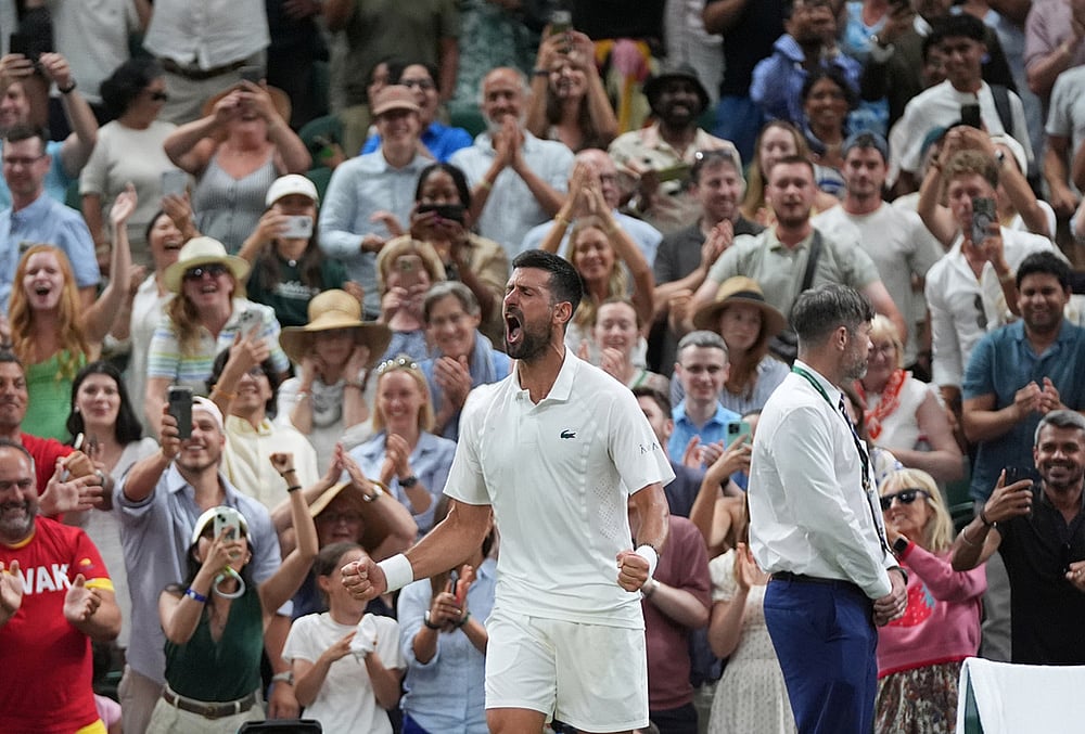 Novak Djokovic of Serbia celebrates winning against Felix Auger-Aliassime of Canada in their quarter-final men's singles match at the Wimbledon Tennis Championships in London, Tuesday, July 7, 2026.  - | Photo: AP/Maja Smiejkowska