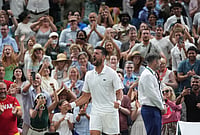 Novak Djokovic Survives Five-Hour Marathon Against Felix Auger-Aliassime To Reach Wimbledon 2026 Semi-Finals | Photo: AP/Maja Smiejkowska : Novak Djokovic of Serbia celebrates winning against Felix Auger-Aliassime of Canada in their quarter-final men's singles match at the Wimbledon Tennis Championships in London, Tuesday, July 7, 2026.