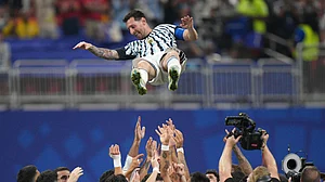 (AP Photo/Jacob Kupferman) : Argentina players toss teammate Lionel Messi (10) into the air as they celebrate after the World Cup round of 16 soccer match between Argentina and Egypt in Atlanta, Tuesday, July 7, 2026.