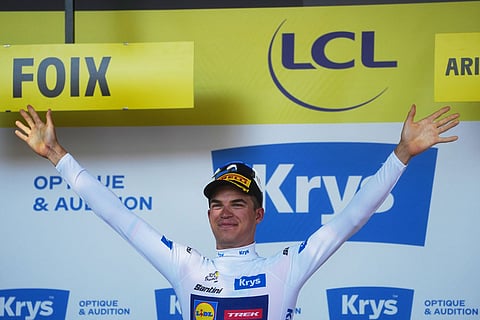 Mathias Vacek of the Czech Republic, wearing the best young rider's white jersey celebrates on the podium after the fourth stage of the Tour de France cycling race with start in Carcassonne and finish in Foix, France.