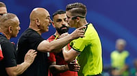 Egypt Accuse FIFA Of Favouring Messi: Did Controversial Decisions Cost Them The World Cup? (AP Photo/Erik S. Lesser) : Egypt head coach Hossam Hassan argues with referee Francois Letexier, of France, during the World Cup round of 16 soccer match between Argentina and Egypt in Atlanta, Tuesday, July 7, 2026.