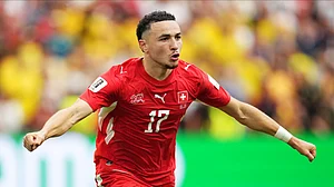 (Ethan Cairns/The Canadian Press via AP) : Switzerland's Ruben Vargas (17) celebrates after making the winning kick in a penalty shootout in the World Cup round of 16 soccer match between Switzerland and Colombia in Vancouver, British Columbia, Tuesday, July 7, 2026.