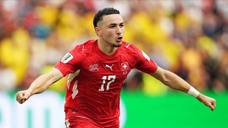 Switzerland's Ruben Vargas (17) celebrates after making the winning kick in a penalty shootout in the World Cup round of 16 soccer match between Switzerland and Colombia in Vancouver, British Columbia, Tuesday, July 7, 2026. - (Ethan Cairns/The Canadian Press via AP)