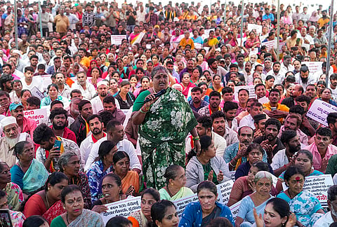Members of the street vendors’ association stage a protest against the ongoing eviction drive, accusing the state government of "violating" the Street Vendors (Protection of Livelihood and Regulation of Street Vending) Act, 2014, in Bengaluru.