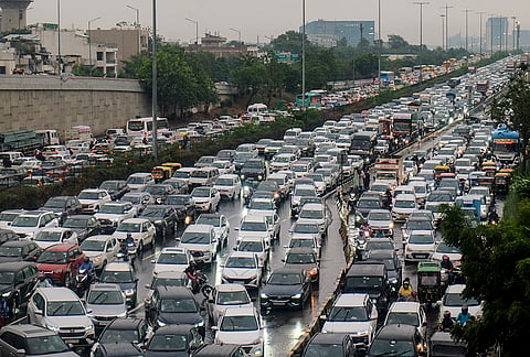 Vehicles stuck in traffic on the Delhi–Gurgaon Expressway after monsoon rains, in Gurugram, Tuesday, July 7, 2026. 