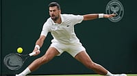 Wimbledon 2026: Ageless Novak Djokovic Says 'It Will Be Nice To Play' Like Lionel Messi Following Five-Hour Marathon | Photo: AP/Maja Smiejkowska : Novak Djokovic of Serbia returns the ball to Felix Auger-Aliassime of Canada in their quarter-final men's singles match at the Wimbledon Tennis Championships in London, Tuesday, July 7, 2026.